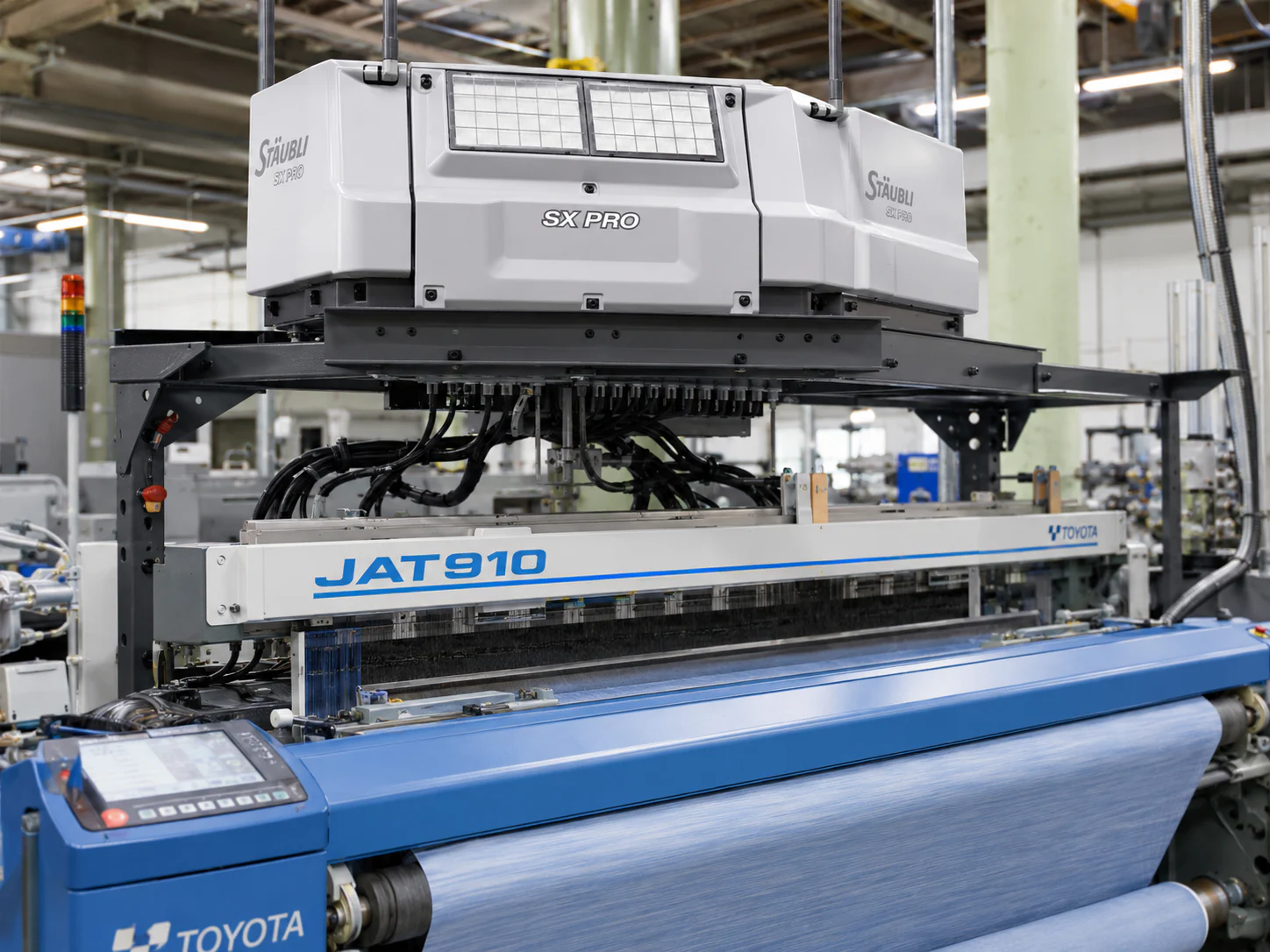 Stäubli Jacquard unit fitted above a Toyota JAT910 air-jet loom
